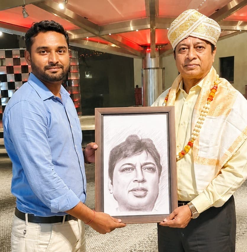 Presentation of a framed portrait at an evening event